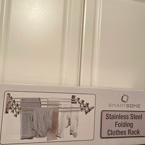 Smartsome stainless steel folding clothes rack.Brand new- still in a box